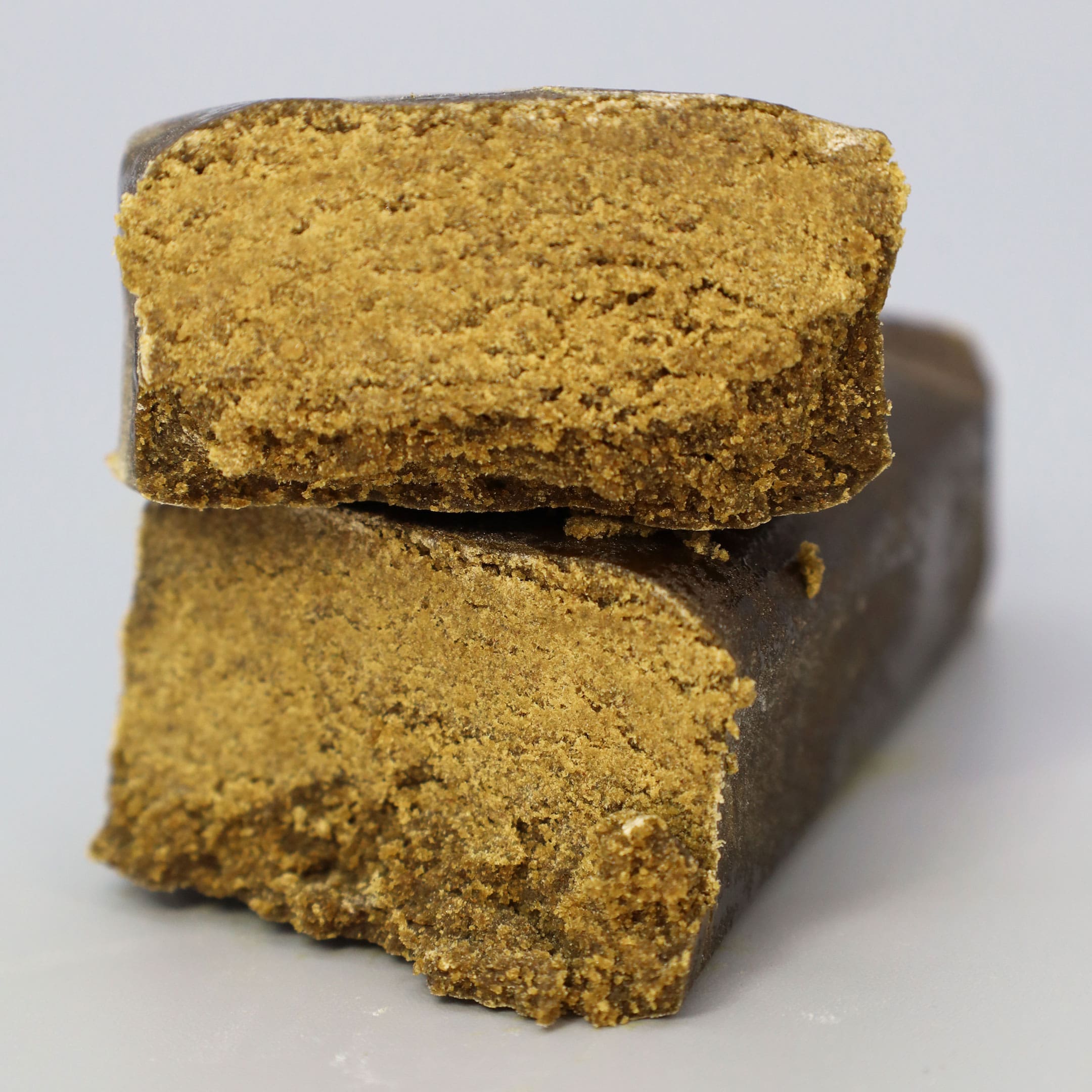 Imagem sobre fundo cinza de CBD Hash Manhattan420 por Greenery420